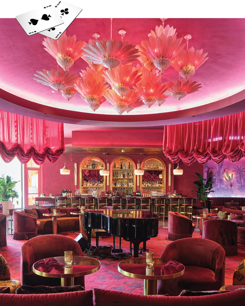 Pink furniture, walls, and chandeliers in the Rouge Room, a recently opened bar in Vegas.