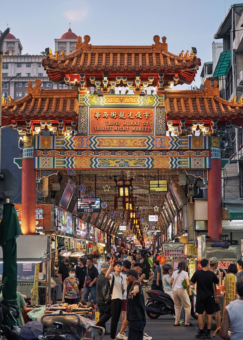 Crowds fill the Huaxi Street Night Market.