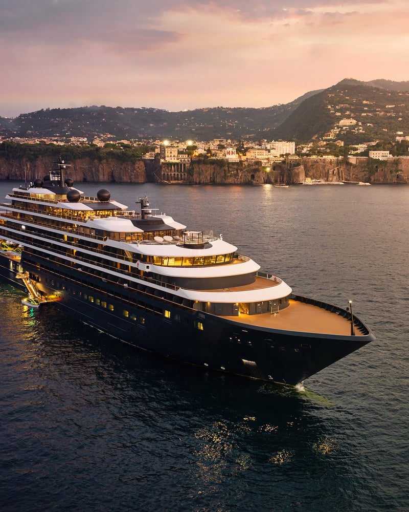 The Ritz-Carlton’s yacht Evrima near Sorrento, Italy, at sunset.