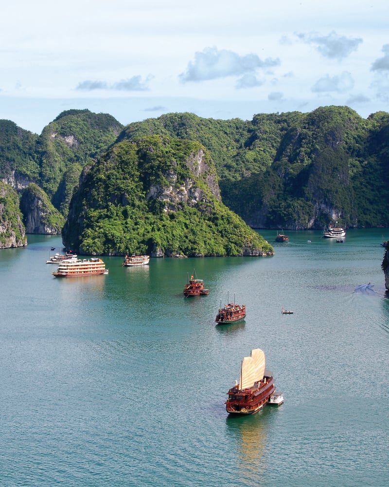 Boats sailing Vietnam’s Ha Long Bay.