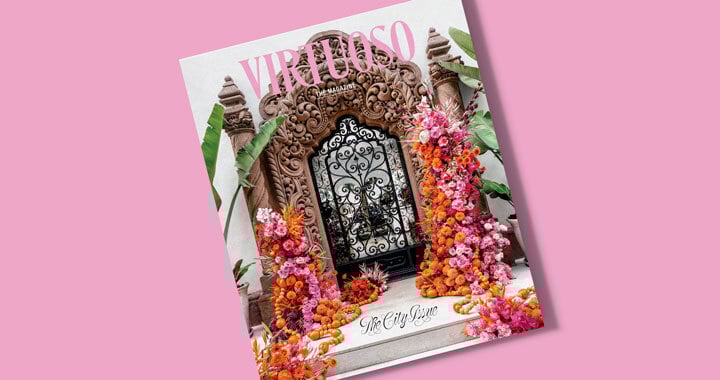 On the January/February cover of Virtuoso, The Magazine, pink and orange flowers cascade in front of the carved stone entrance to Casa Polanco and text reads The City Issue.