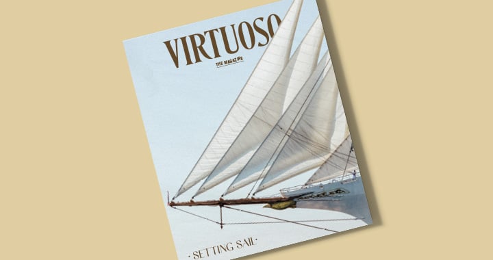The November cover of Virtuoso, The Magazine shows the bow of a masted ship at sea and a crew member at work. A cover line reads Setting Sail.