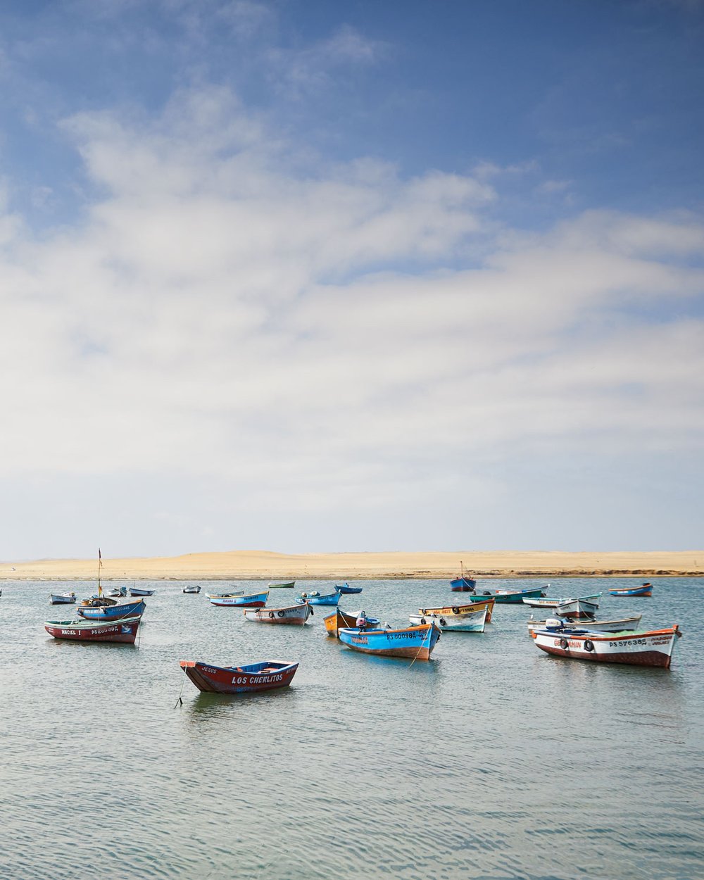 Colorful fishing boats anchored at Playa Lagunillas.