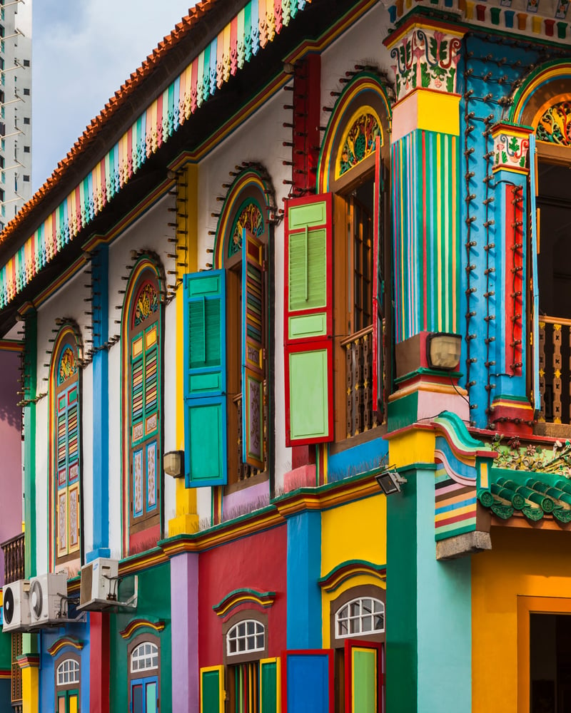 The multicolored exterior of a nineteenth-century shophouse building in Singapore’s Little India neighborhood.