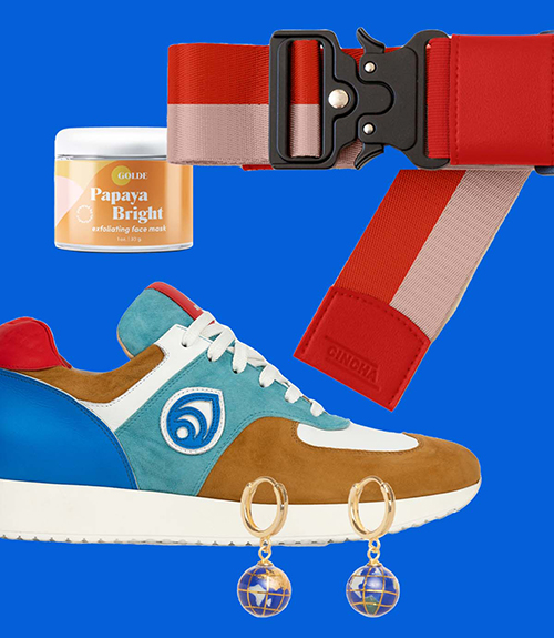 Cutouts of a tennis shoe, an exfoliating face mask, a travel belt, and earrings on a blue background.