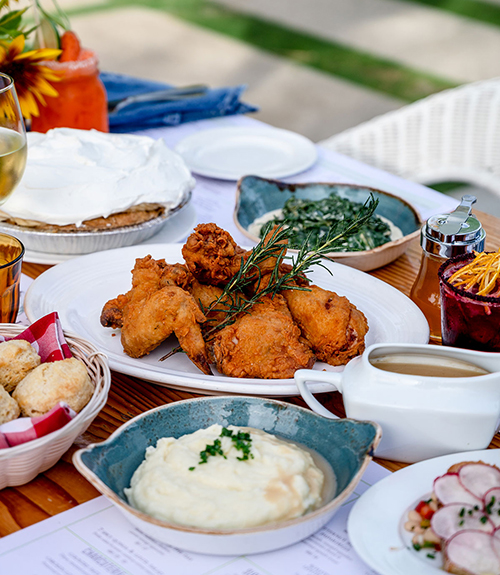 Fried chicken, mashed potatoes, and gravy at Flora Farms in Los Cabos.