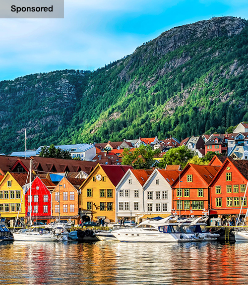 o	Bright buildings line the waterfront of Bergen, Norway.