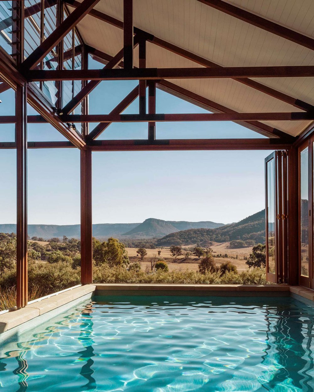 A sheltered private pool with a view of Australia’s Wolgan Valley.