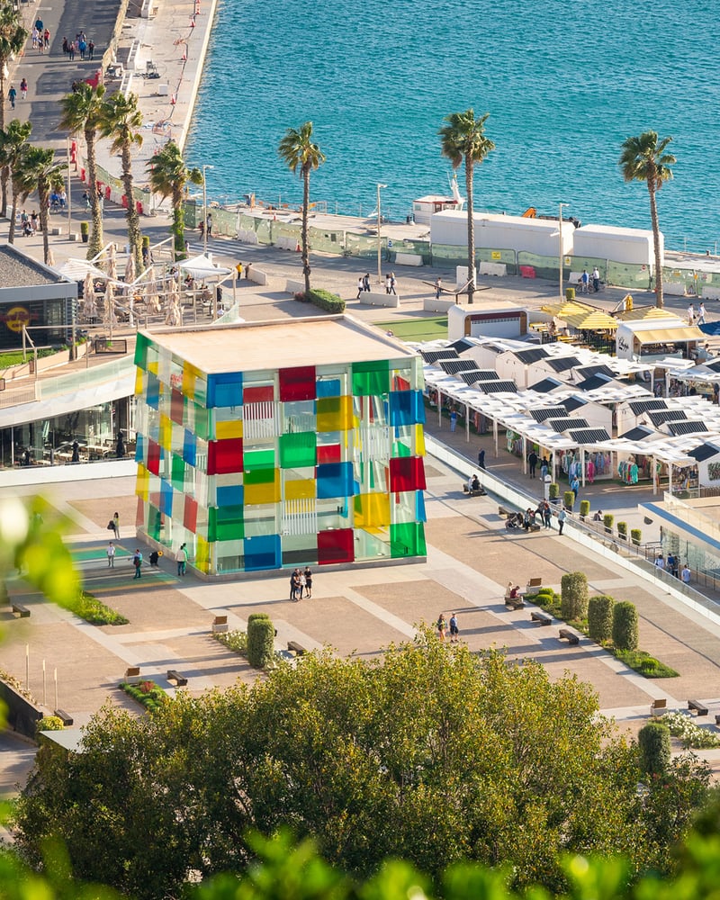 The box-shaped Centre Pompidou, made of red, blue, green, yellow, and transparent glass, on Málaga’s waterfront.